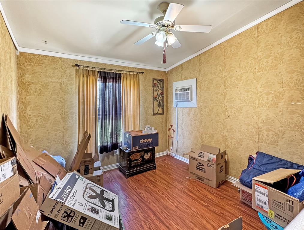 1791 County Road 3855 Poolville, TX 76487 - Photo 22 of 31 a living room with furniture and a window