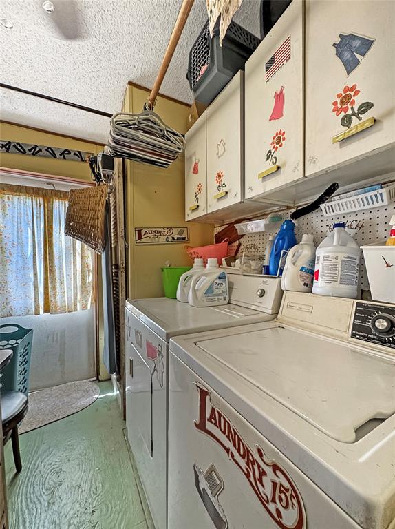 1791 County Road 3855 Poolville, TX 76487 - Photo 23 of 31 a utility room with dryer and washer