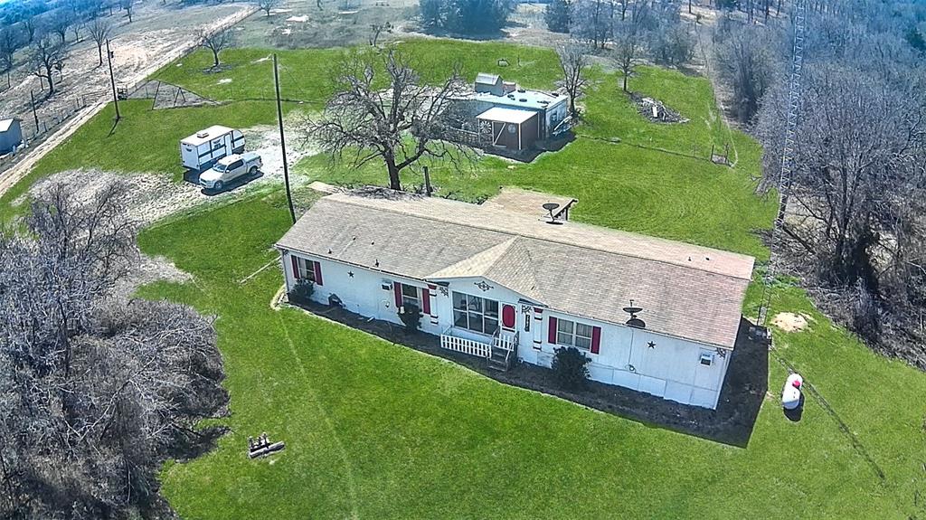 1791 County Road 3855 Poolville, TX 76487 - Photo 29 of 31 an aerial view of a house