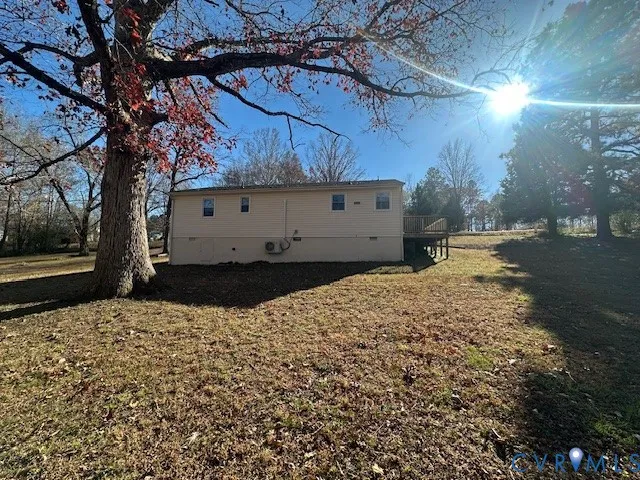 a backyard of a house with lots of green space