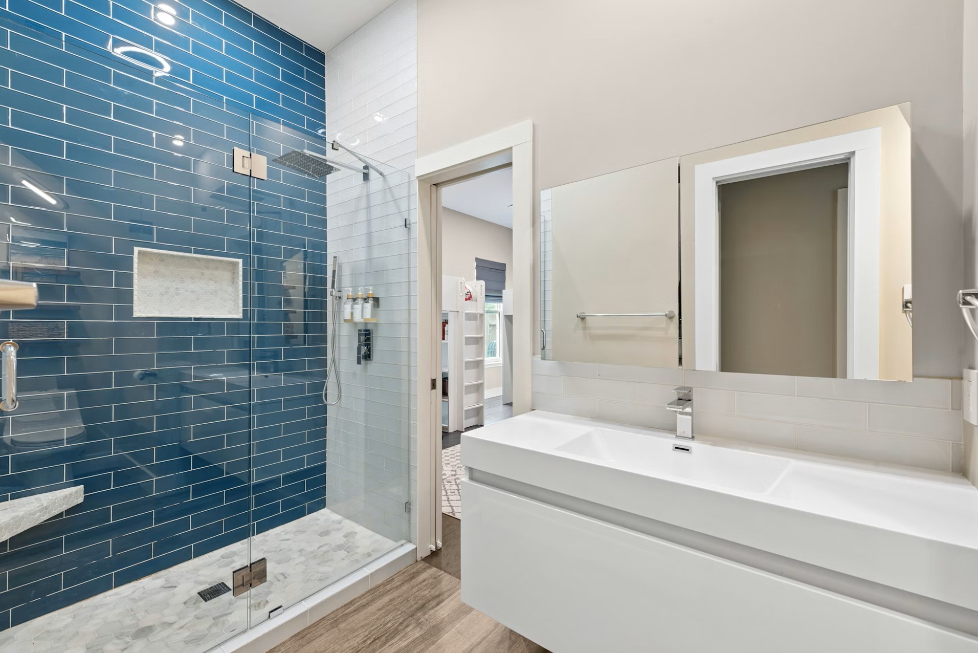 320 El Socorro Lane Austin, TX 78732 - Photo 10 of 40 a bathroom with a sink and a mirror