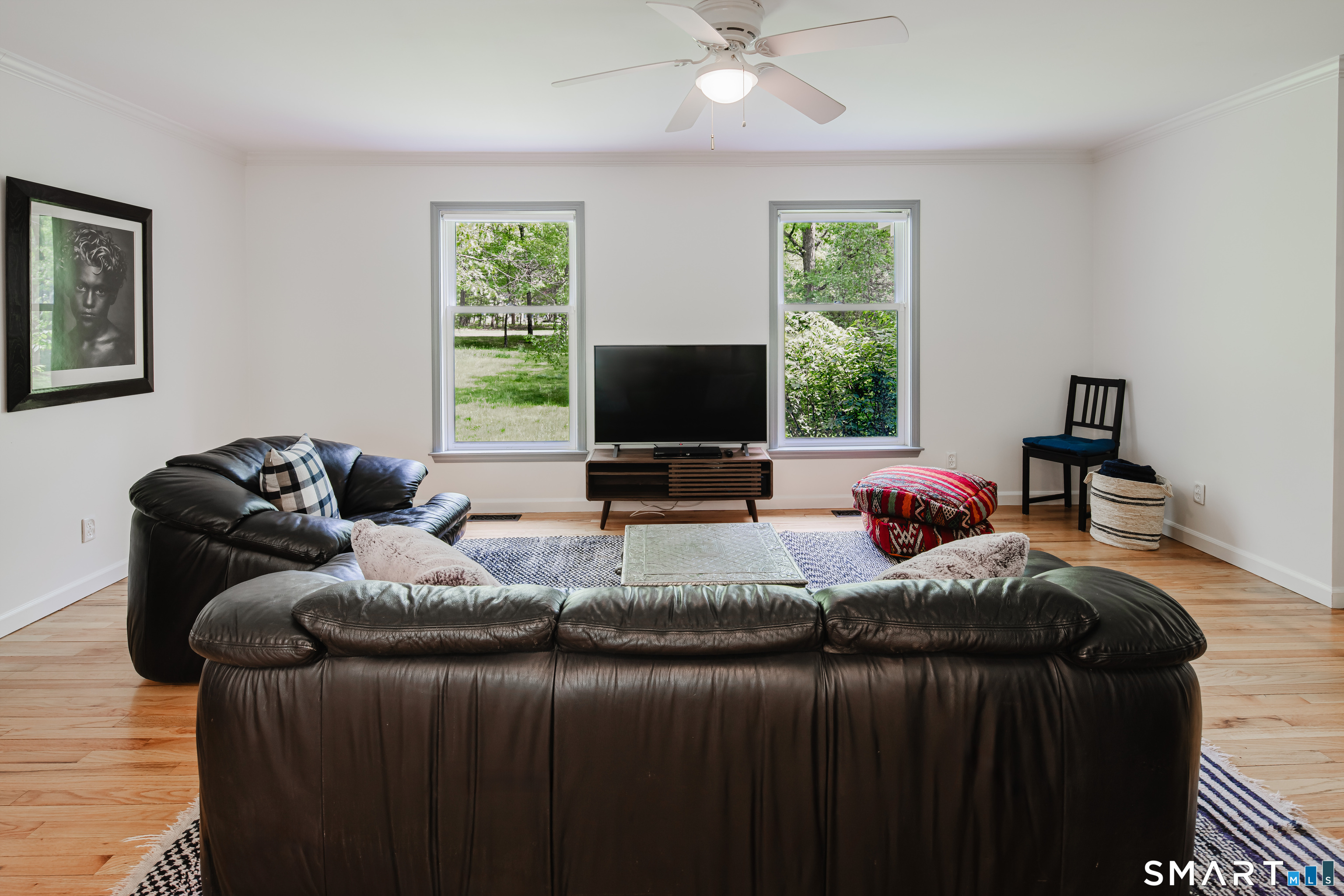 3 Partridge Trail Sherman, CT 06784 - Photo 21 of 37 a living room with furniture and a flat screen tv