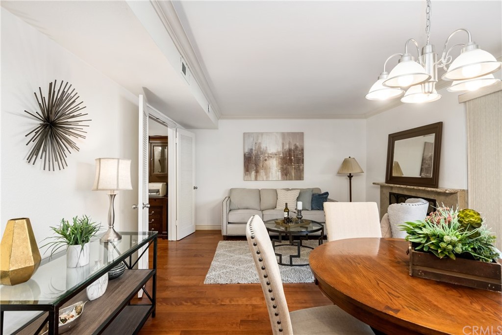 4625 Green Tree Lane Irvine, CA 92612 - Photo 19 of 51 a living room with furniture potted plant and a window