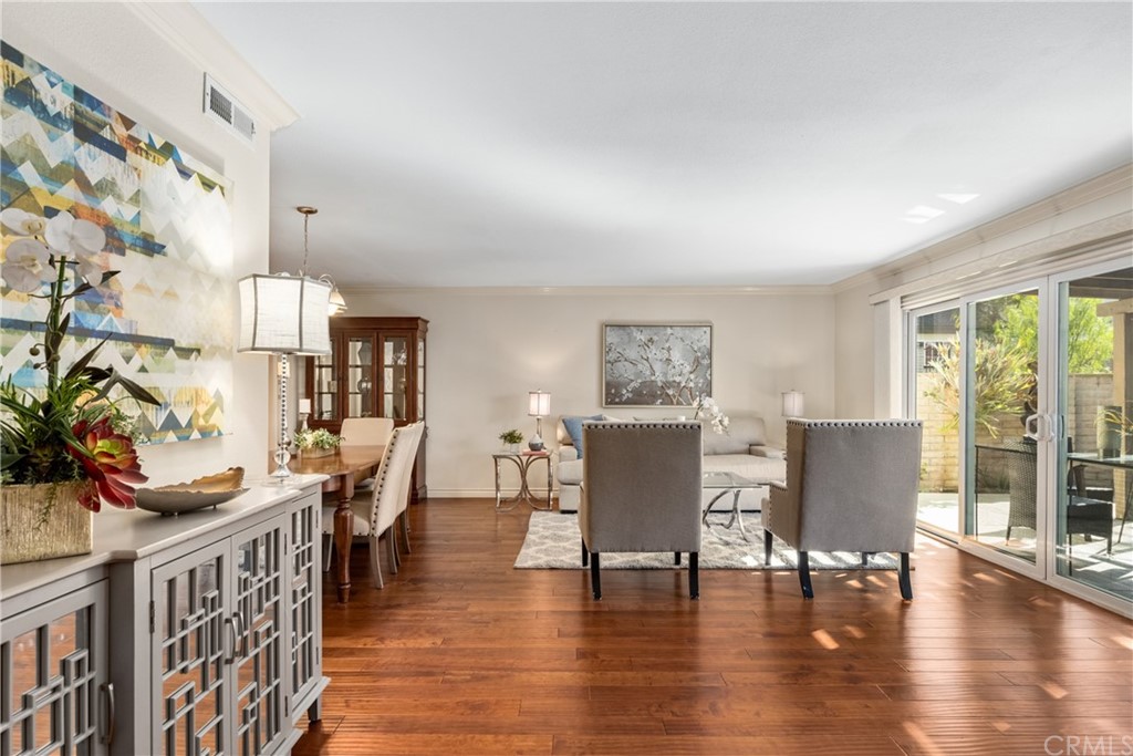 4625 Green Tree Lane Irvine, CA 92612 - Photo 2 of 51 a view of a dining room with furniture window and wooden floor