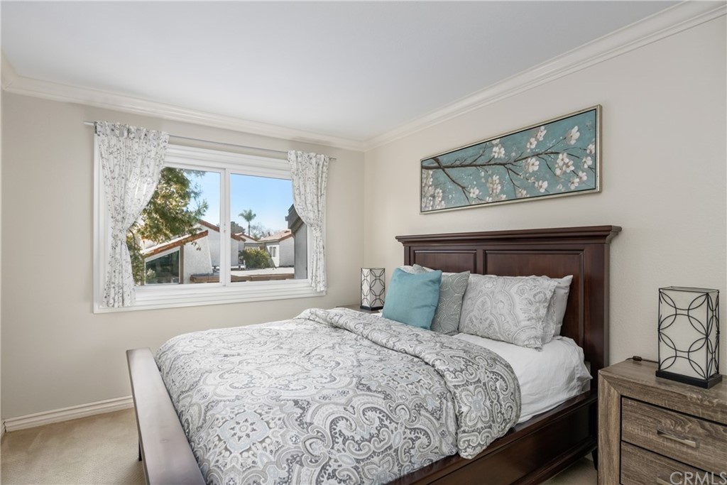 4625 Green Tree Lane Irvine, CA 92612 - Photo 25 of 51 a bedroom with a bed and painting on the wall