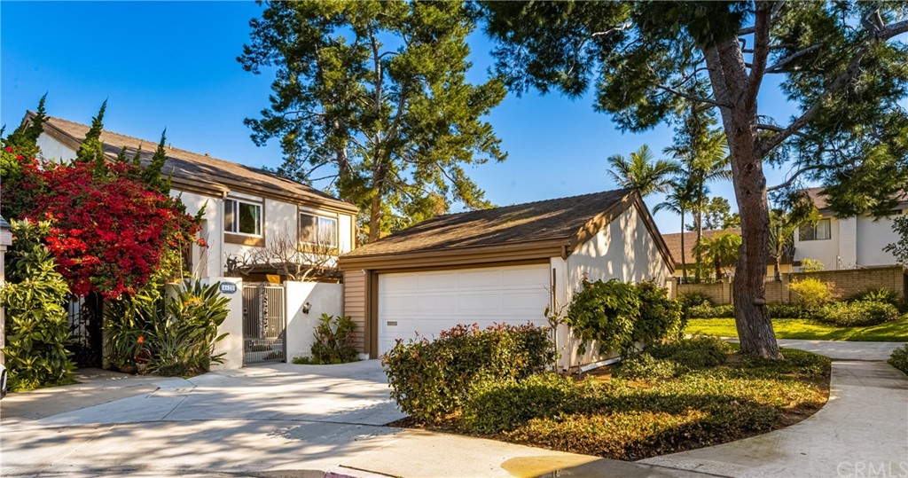 4625 Green Tree Lane Irvine, CA 92612 - Photo 38 of 51 a front view of a house with garden