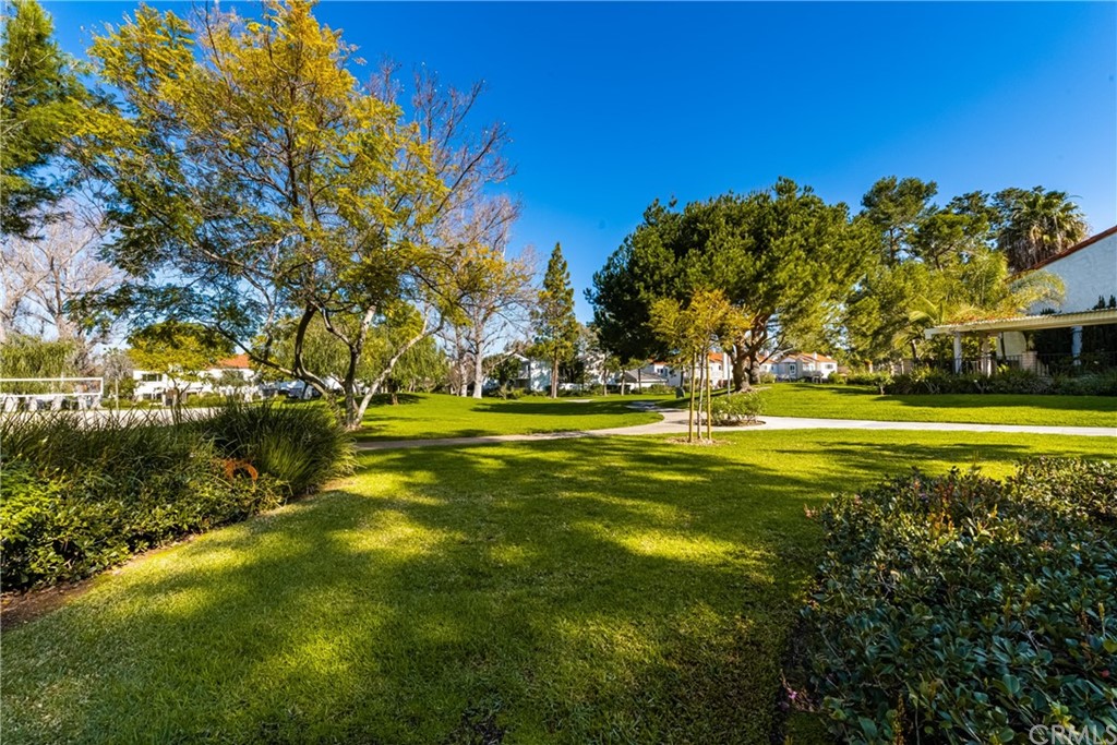 4625 Green Tree Lane Irvine, CA 92612 - Photo 44 of 51 a view of a swimming pool with an outdoor space and seating area