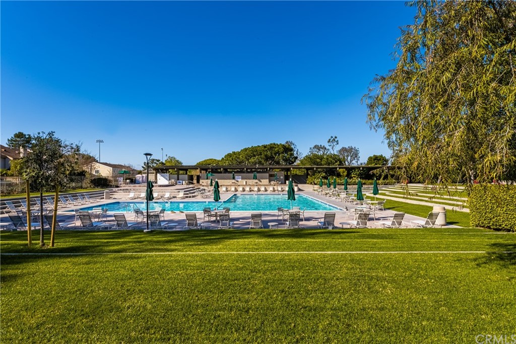 4625 Green Tree Lane Irvine, CA 92612 - Photo 48 of 51 a view of a swimming pool with a yard