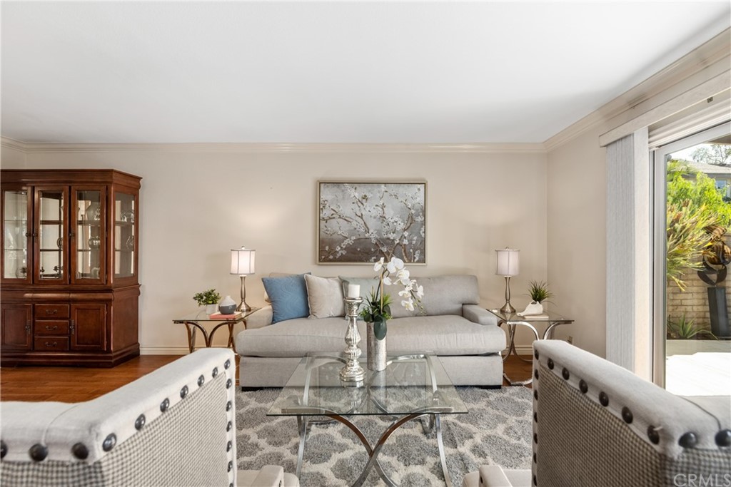 4625 Green Tree Lane Irvine, CA 92612 - Photo 7 of 51 a living room with furniture and a large window