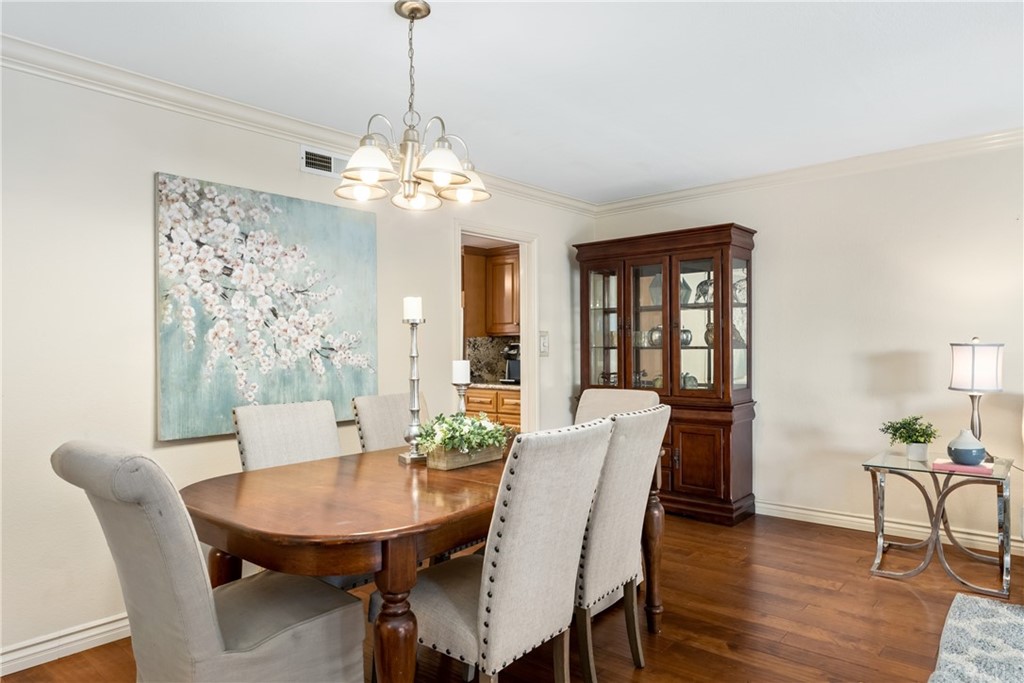 4625 Green Tree Lane Irvine, CA 92612 - Photo 9 of 51 a view of a dining room with furniture window and wooden floor