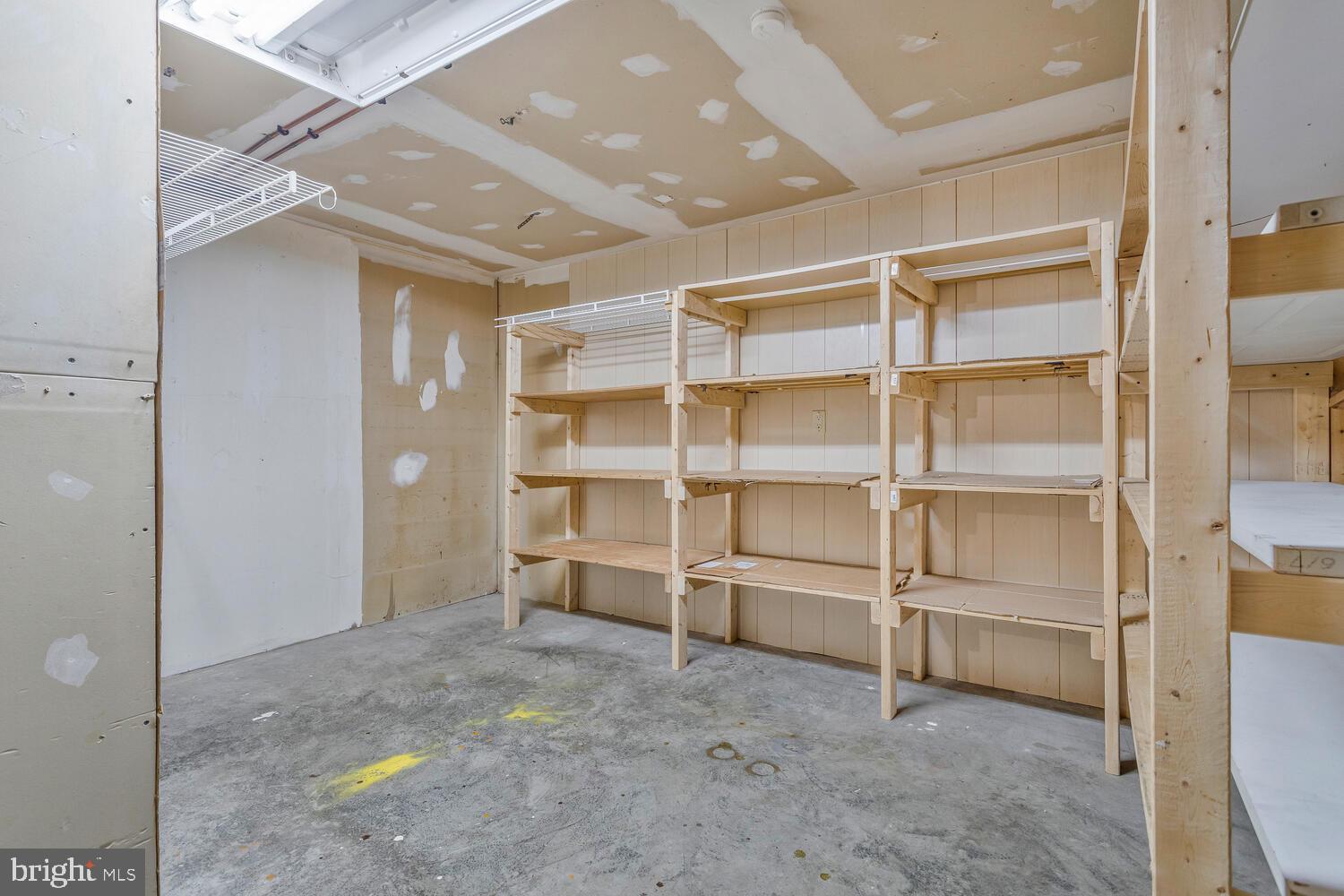 111 Autumn Court Huntingtown, MD 20639 - Photo 34 of 48 a view of an empty room with a cabinet