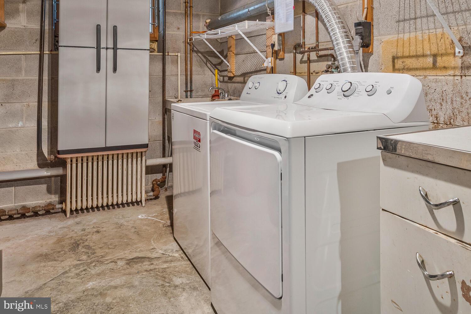 111 Autumn Court Huntingtown, MD 20639 - Photo 37 of 48 a utility room with a washer and dryer