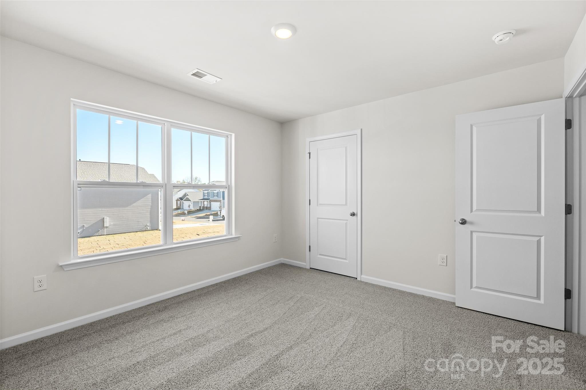 97 Salers Road Fletcher, NC 28732 - Photo 16 of 28 a view of an empty room with a window