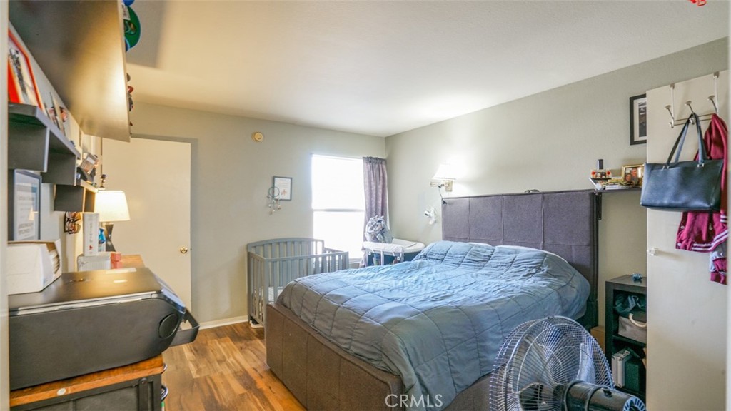 7641 Reseda Boulevard, Unit 128Z Reseda, CA 91335 - Photo 24 of 44 a bedroom with a bed and furniture