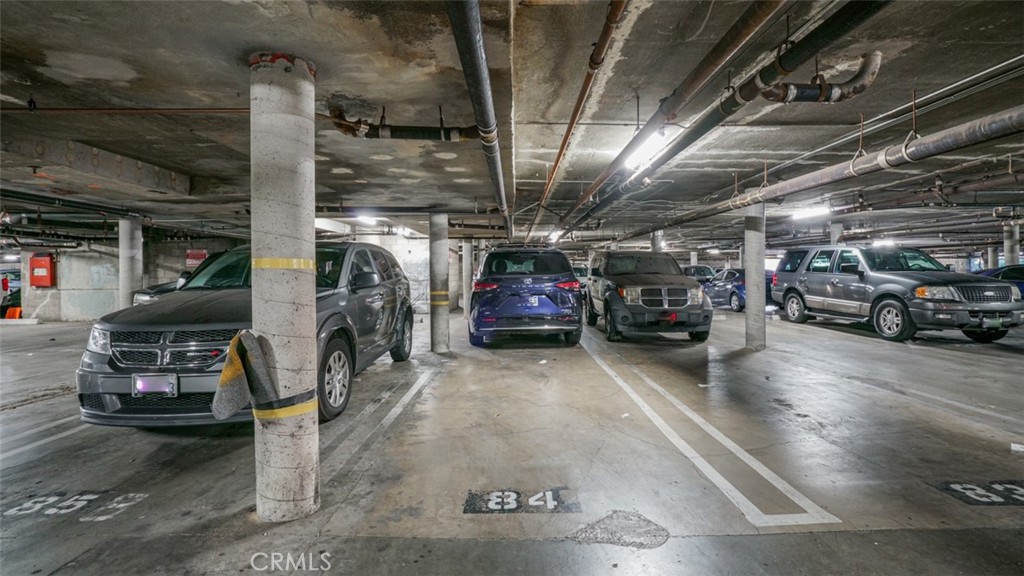 7641 Reseda Boulevard, Unit 128Z Reseda, CA 91335 - Photo 36 of 44 a view of parking garage with cars
