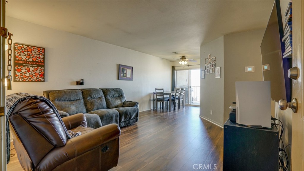 7641 Reseda Boulevard, Unit 128Z Reseda, CA 91335 - Photo 5 of 44 a media room with lots of chairs and wooden floor