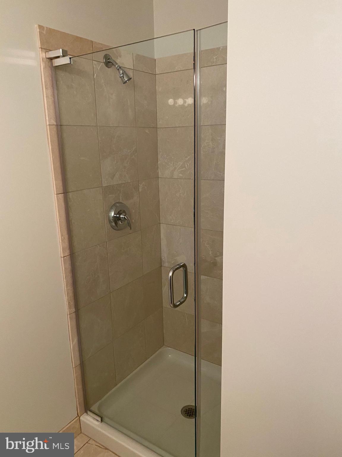 901 North Penn Street, Unit F207 Philadelphia, PA 19123 - Photo 12 of 12 a bathroom with a shower