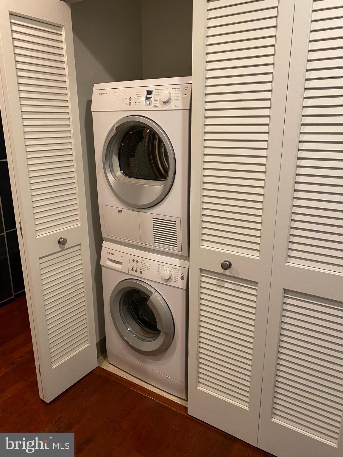 901 North Penn Street, Unit F207 Philadelphia, PA 19123 - Photo 9 of 12 a utility room with dryer and washer