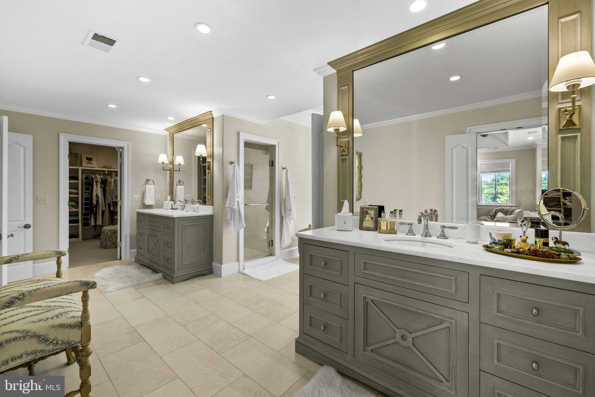 36190 Turkey Roost Road Middleburg, VA 20117 - Photo 40 of 88 a spacious bathroom with a granite countertop sink mirror and bathtub