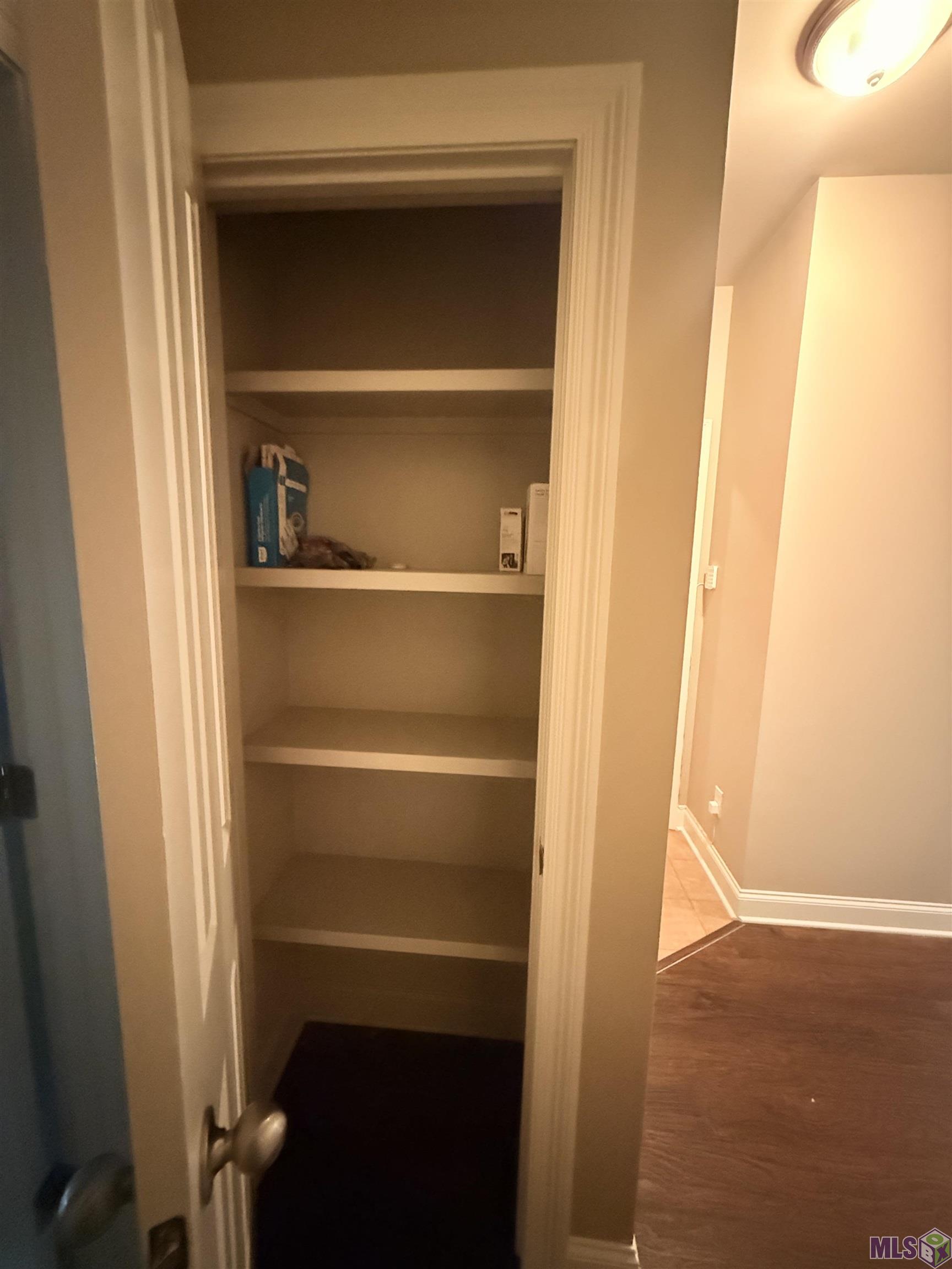 14013 Stone Gate Drive Baton Rouge, LA 70816 - Photo 7 of 13 Linen Closet in hallway