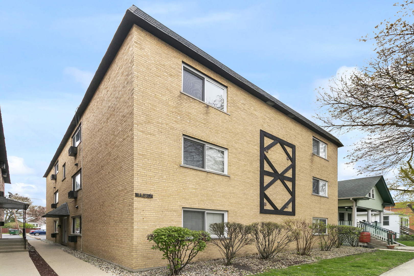 1130 Dunlop Avenue, Unit 2C Forest Park, IL 60130 - Photo 1 of 15 a backyard of a house with lots of green space