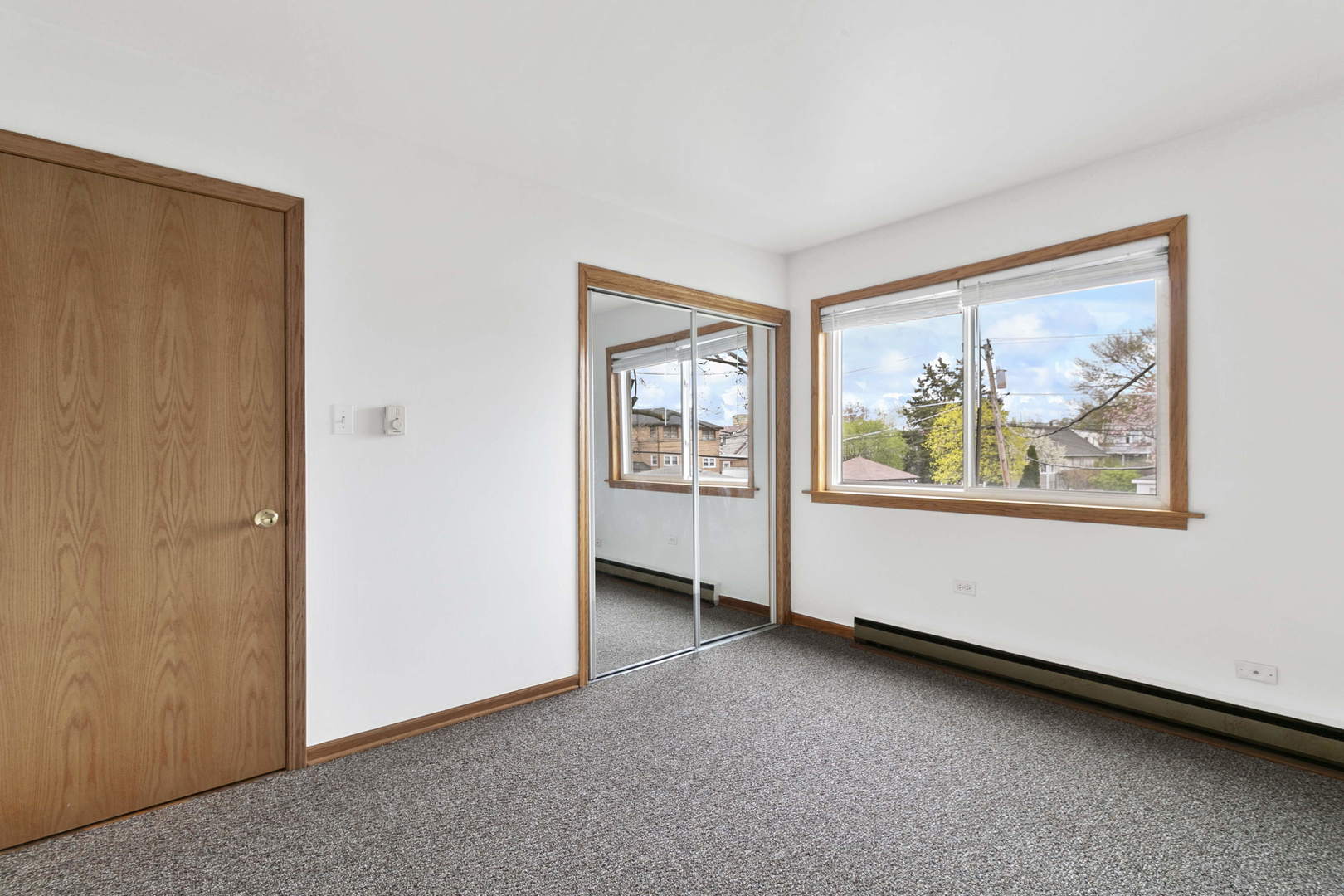 1130 Dunlop Avenue, Unit 2C Forest Park, IL 60130 - Photo 10 of 15 a view of an empty room with a window