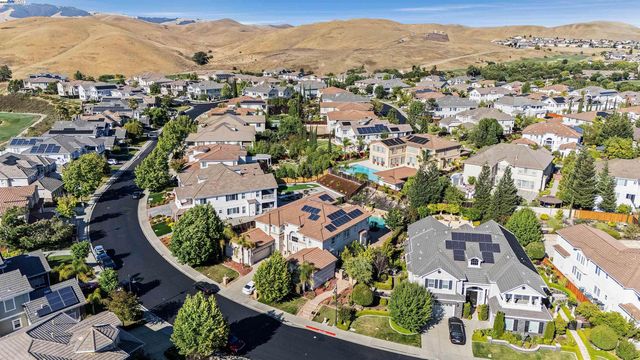 an aerial view of a city with lots of residential buildings