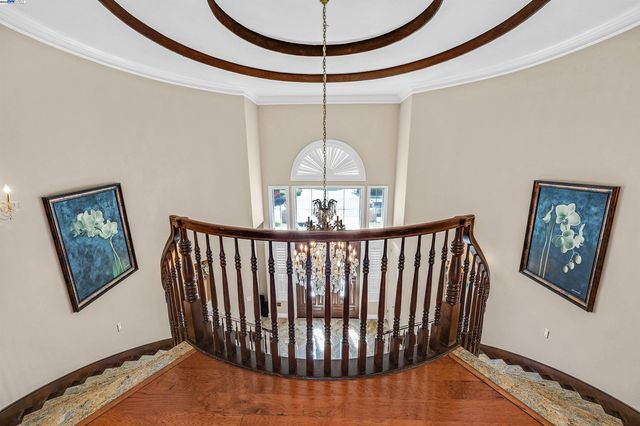 a view of entryway with a chandelier