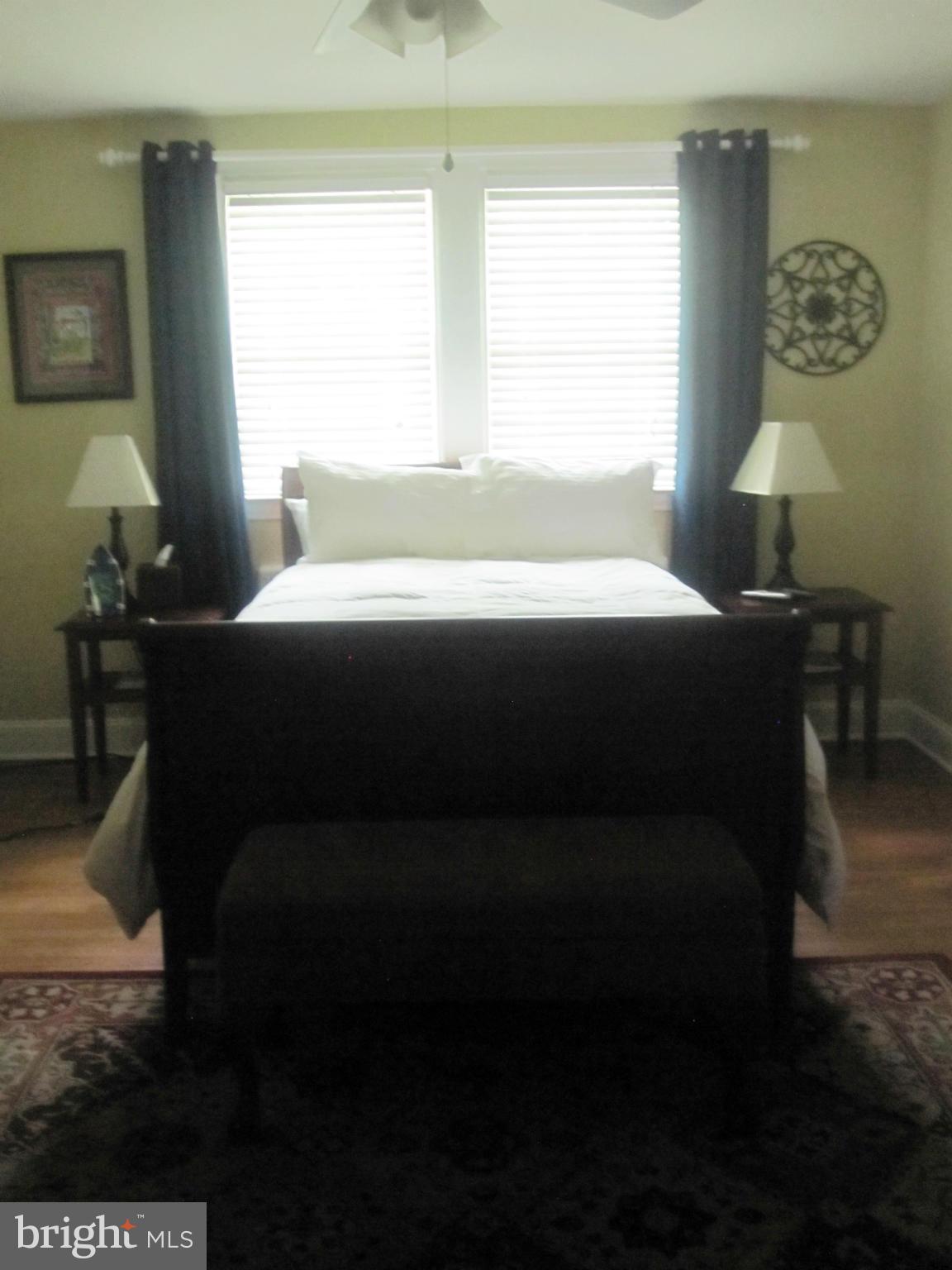 303 Murdock Road Baltimore, MD 21212 - Photo 13 of 25 a bedroom with a bed and window
