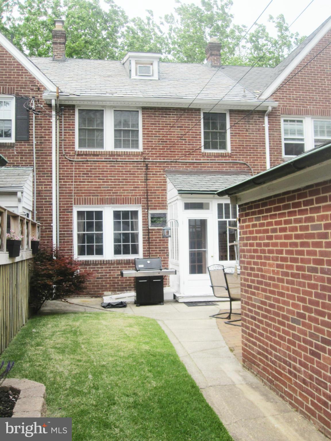 303 Murdock Road Baltimore, MD 21212 - Photo 23 of 25 a front view of a house with garden