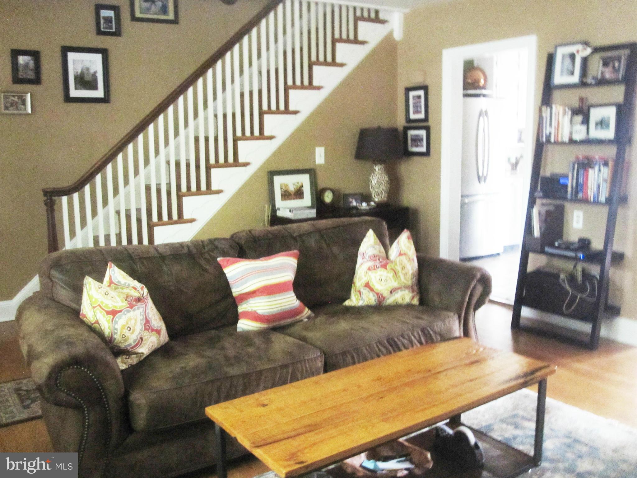 303 Murdock Road Baltimore, MD 21212 - Photo 4 of 25 a living room with furniture and wooden floor