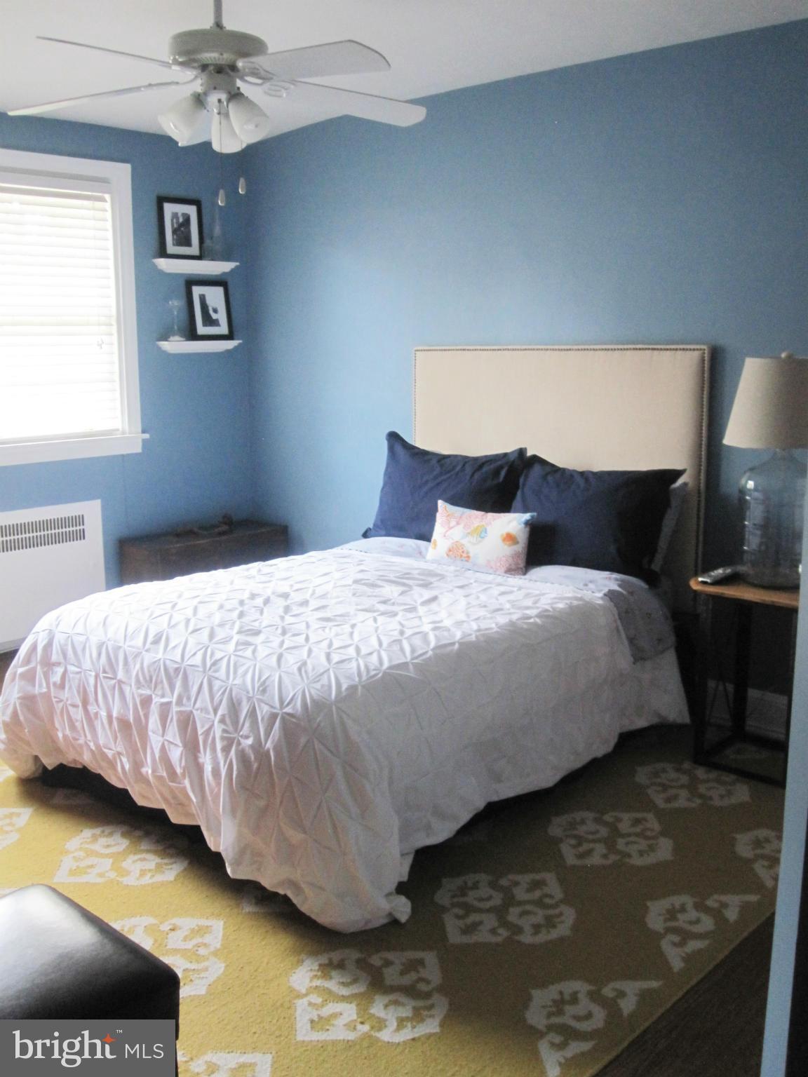 303 Murdock Road Baltimore, MD 21212 - Photo 9 of 25 a bedroom with a bed and window