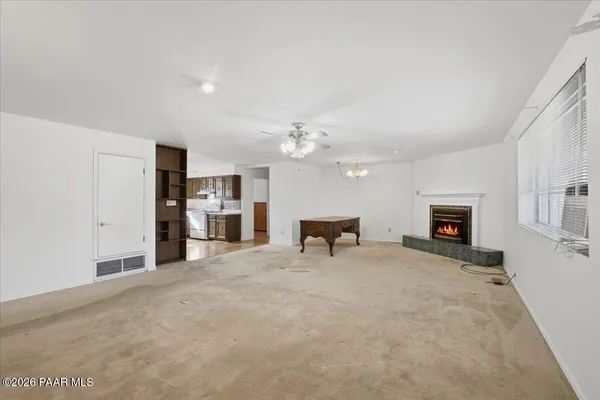 a view of a livingroom with a fireplace