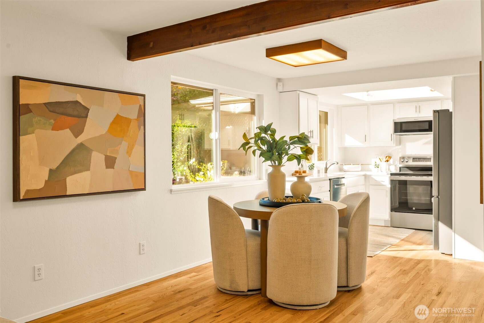 4730 228th Street Southeast Bothell, WA 98021 - Photo 12 of 37 a dining room with furniture and wooden floor