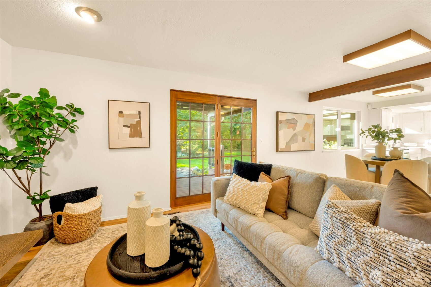 4730 228th Street Southeast Bothell, WA 98021 - Photo 16 of 37 a living room with furniture and a potted plant