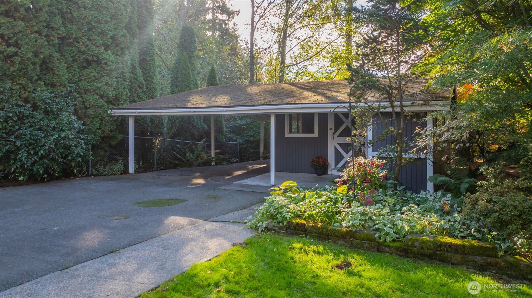 4730 228th Street Southeast Bothell, WA 98021 - Photo 28 of 37 a backyard of a house with lots of green space