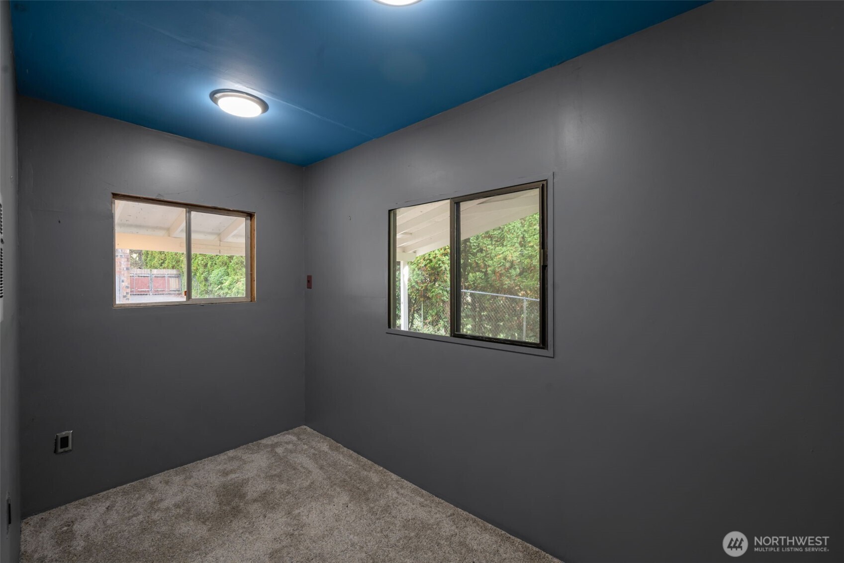 4730 228th Street Southeast Bothell, WA 98021 - Photo 31 of 37 an empty room with windows