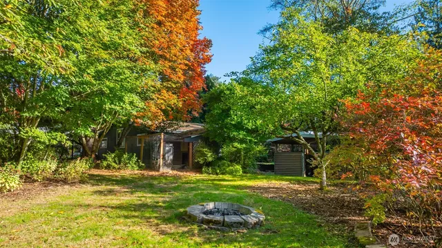 a view of a park that has sign board