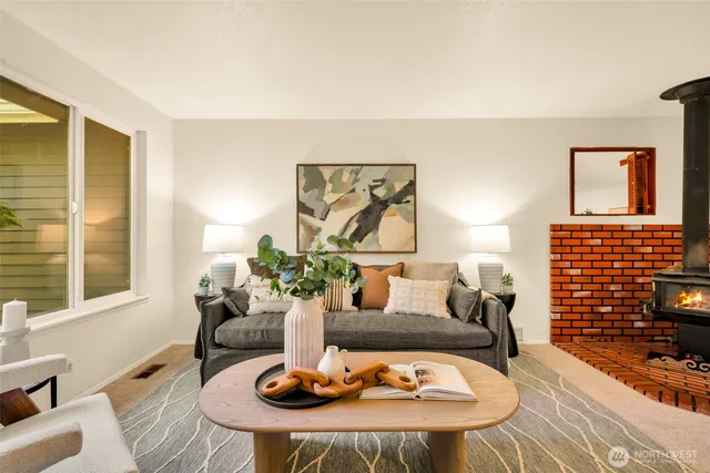 a living room with furniture and a window