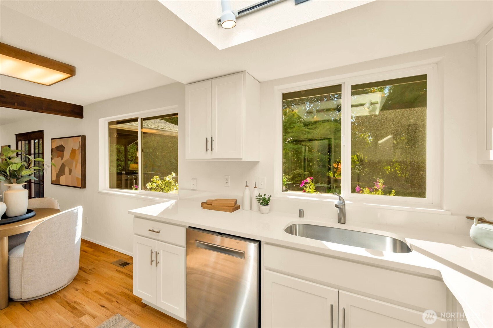 4730 228th Street Southeast Bothell, WA 98021 - Photo 10 of 37 a kitchen with a sink and a window