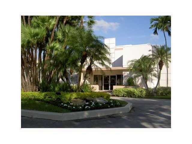 18761 Garbo Terrace, Unit 7 Boca Raton, FL 33496 - Photo 8 of 11 a picture of a house with a yard