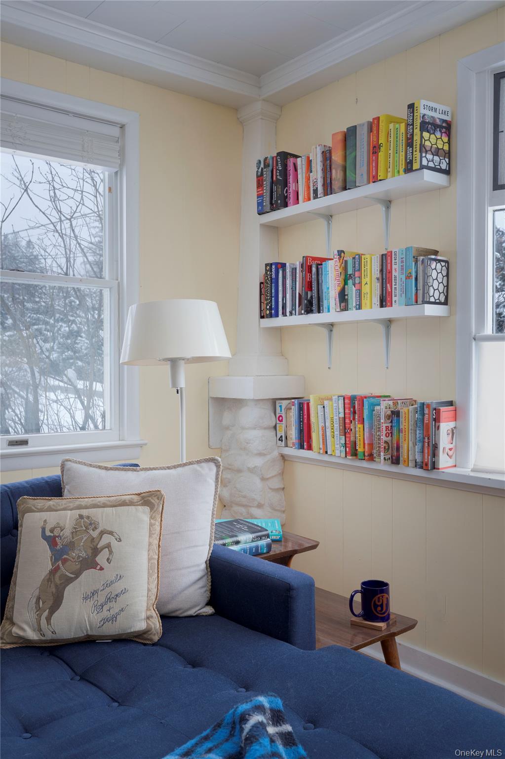 10 Fred Hessinger Road Callicoon Center, NY 12724 - Photo 10 of 28 a living room with furniture and a book shelf