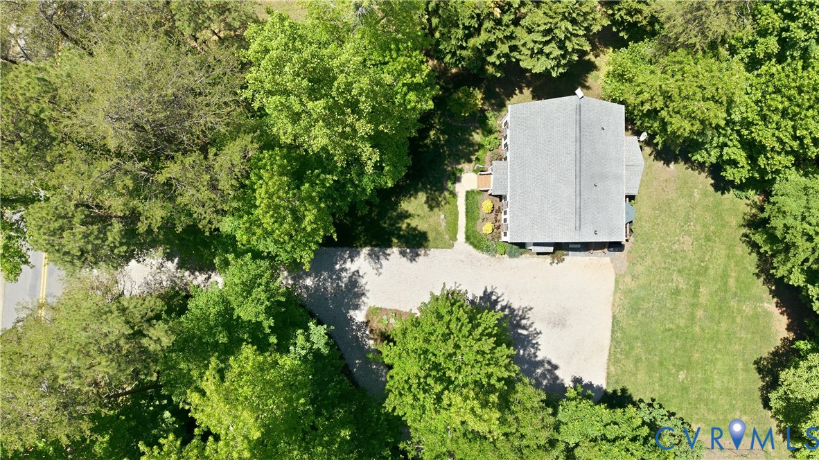 1570 Rock Castle Road Goochland, VA 23063 - Photo 43 of 53 Property featuring a gray shingle roof, surrounded