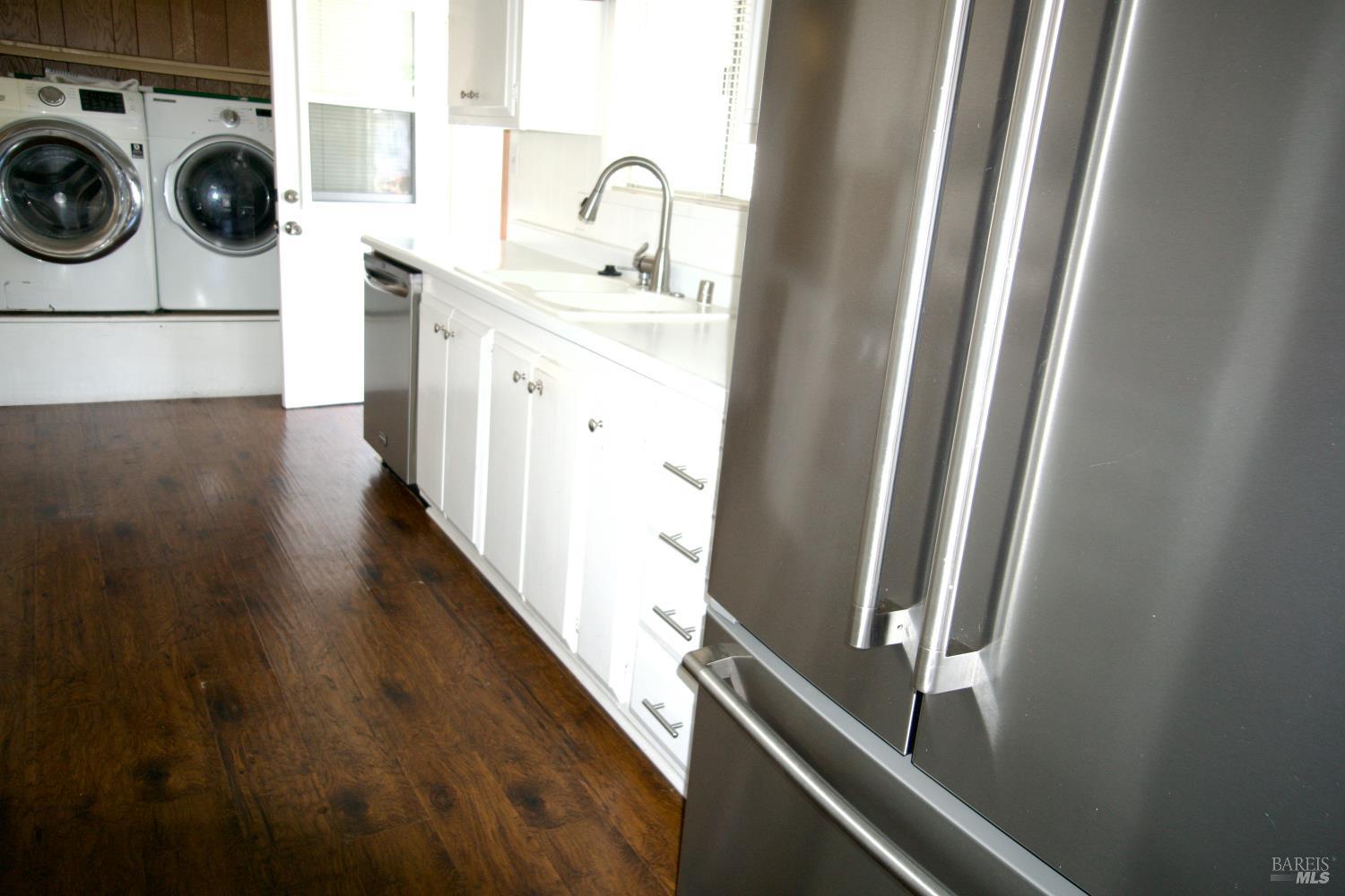 211 Colonial Park Drive Santa Rosa, CA 95403 - Photo 15 of 26 Refrigerator, sink, dishwasher, washer and dryer