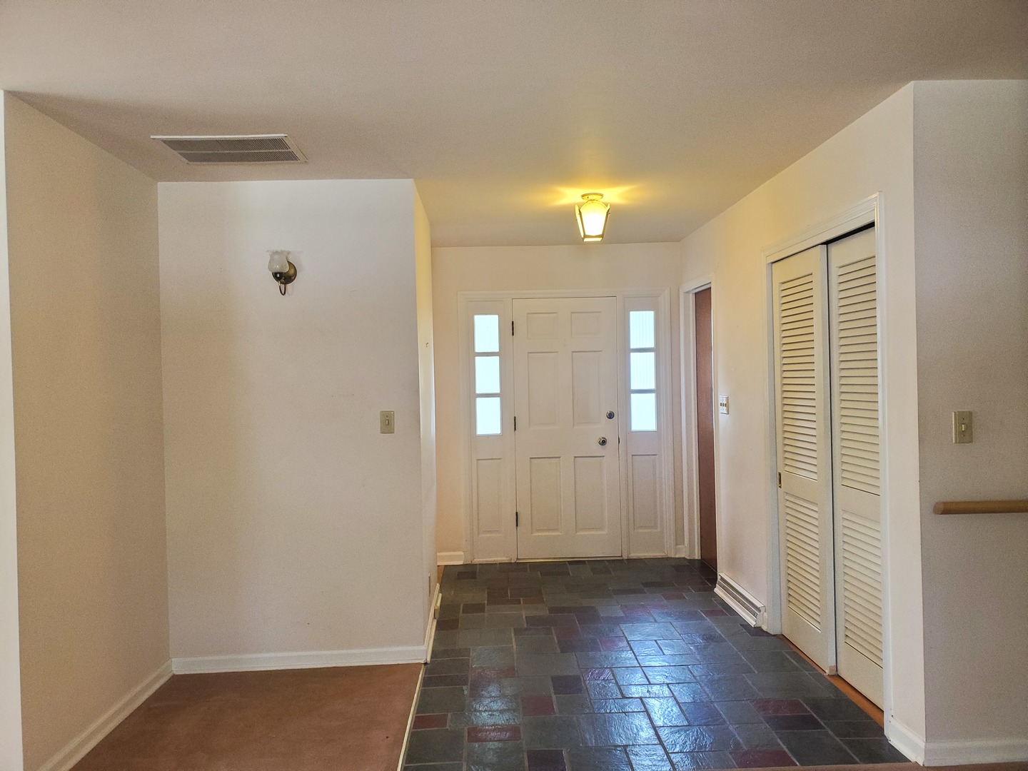 1910 Robert Drive Champaign, IL 61821 - Photo 2 of 10 a view of a bathroom with wooden floor