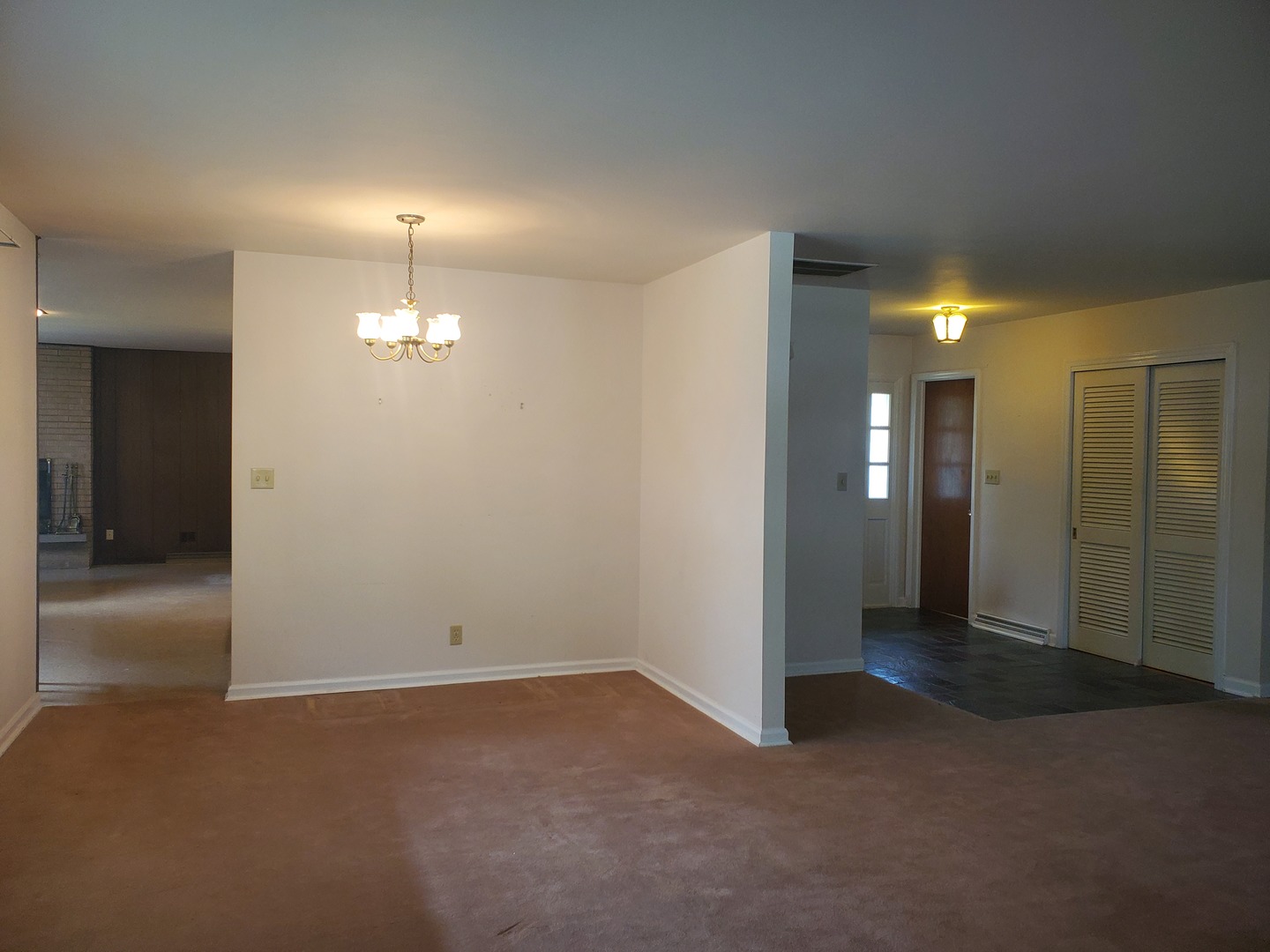 1910 Robert Drive Champaign, IL 61821 - Photo 4 of 10 an empty room with a bathroom