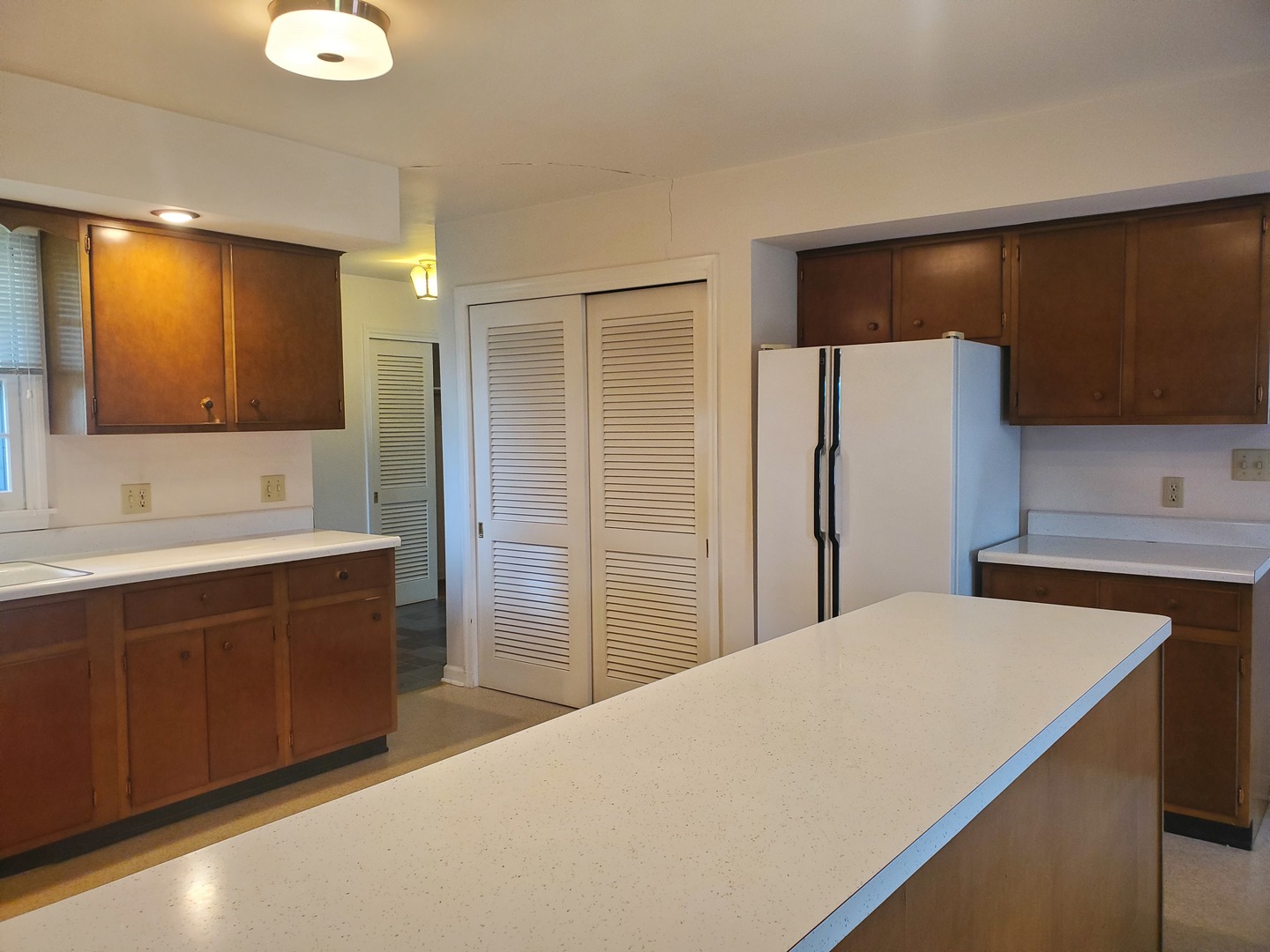 1910 Robert Drive Champaign, IL 61821 - Photo 6 of 10 a spacious bathroom with a double vanity sink a mirror and a shower