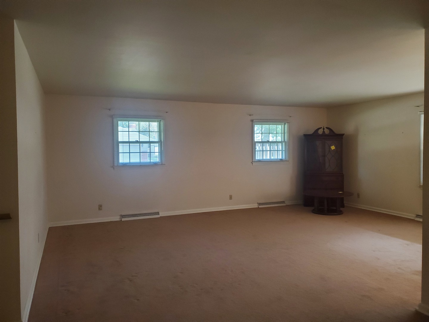 1910 Robert Drive Champaign, IL 61821 - Photo 7 of 10 an empty room with windows