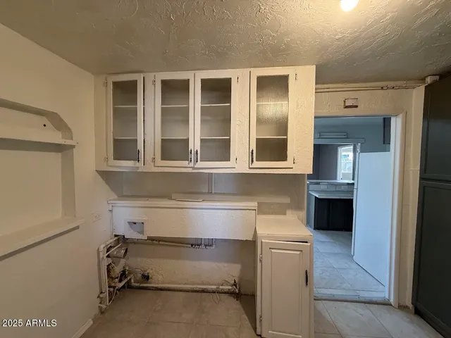 a view of storage and utility room in a house