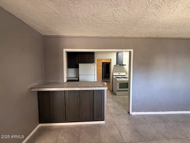 a view of kitchen with a sink